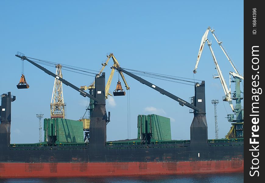 Lifting cranes in the port.