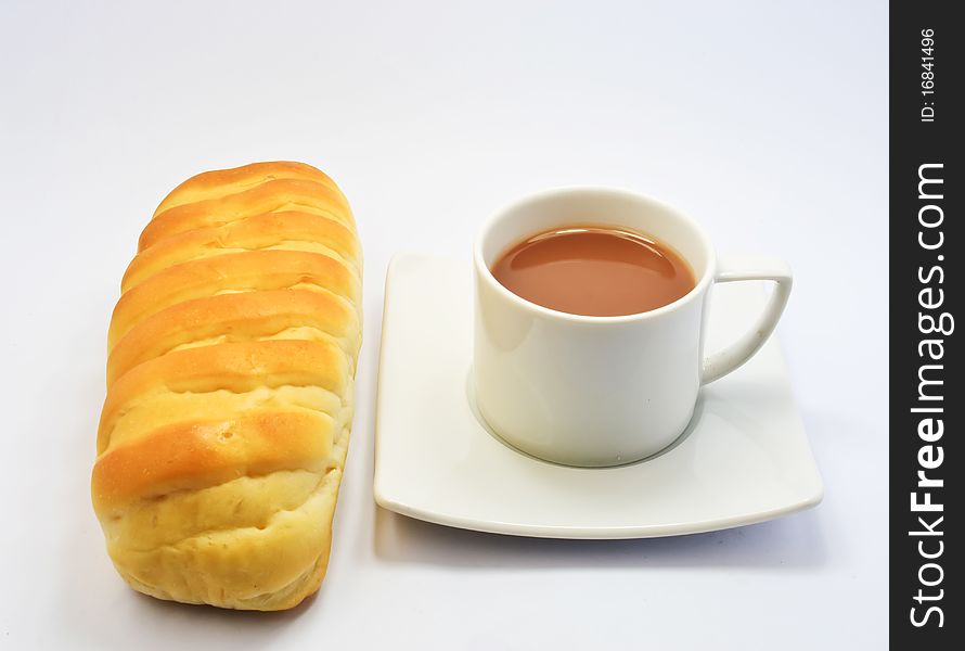 Coffee and bread on white background.