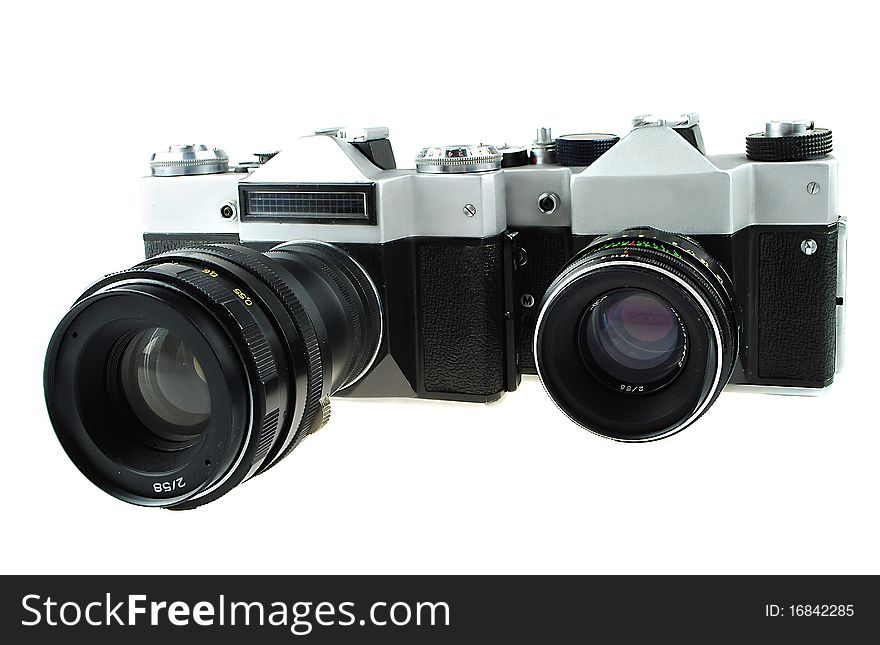 The camera in style of a retro is isolated on a white background