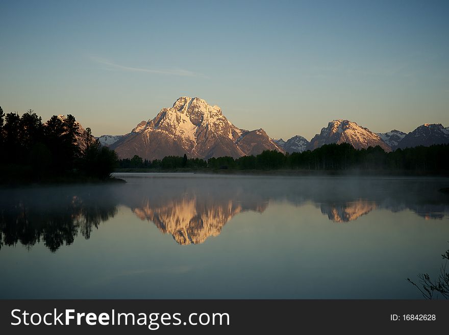 Mist And Mountains On The Water