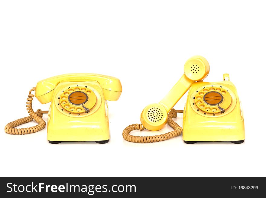 Two old telephone on white background. Two old telephone on white background