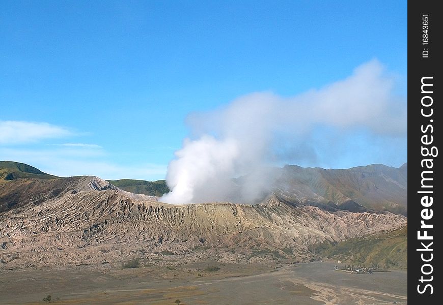 Fuming volcano Bromo in Tengger Caldera, Java, Indonesia. Fuming volcano Bromo in Tengger Caldera, Java, Indonesia