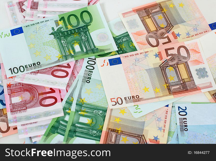 Euro paper money and coins