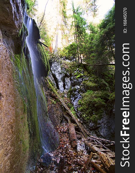 Small waterfall on a stream in european mountain. Small waterfall on a stream in european mountain.