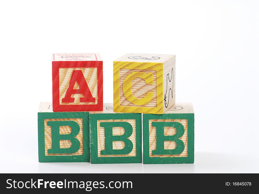 Children learning letter blocks isolated on white. Children learning letter blocks isolated on white