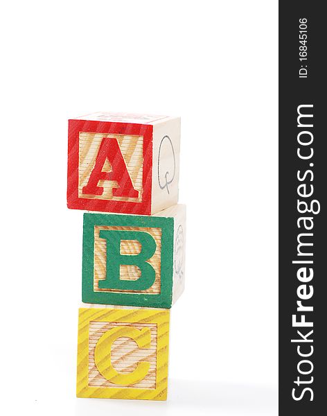 Children learning letter blocks isolated on white. Children learning letter blocks isolated on white
