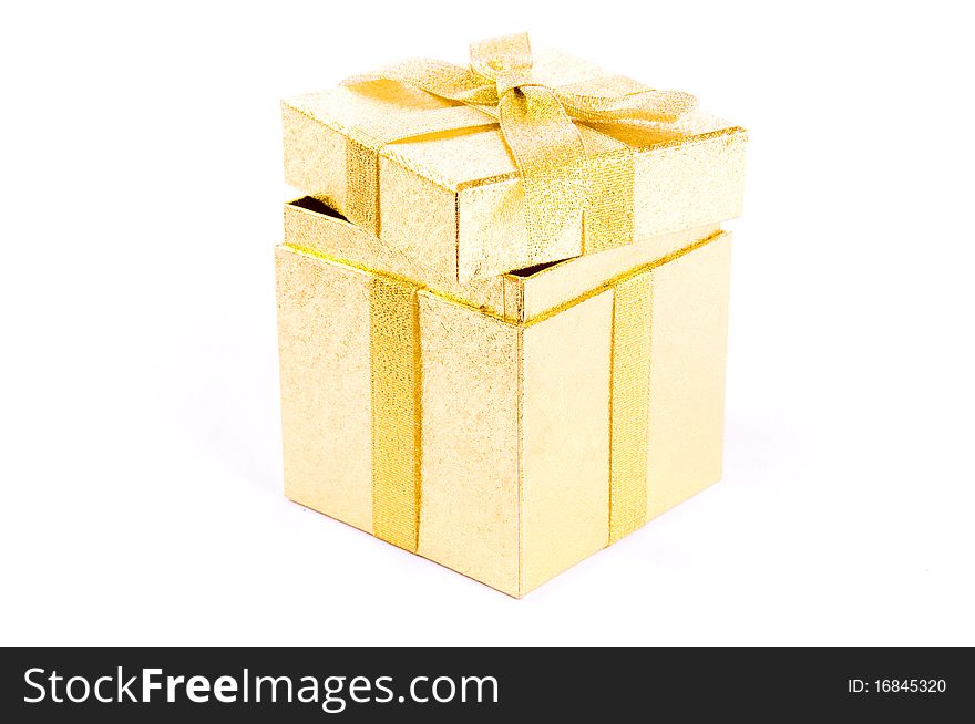 Christmas open giftbox on white background, with golden ribbon