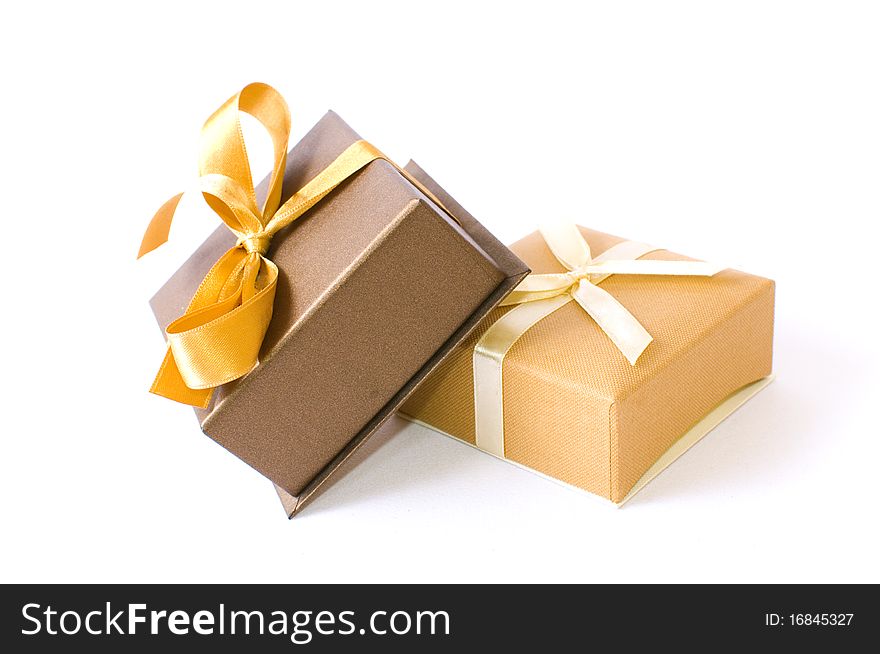 Christmas gift-boxes on white background, with ribbons. Christmas gift-boxes on white background, with ribbons