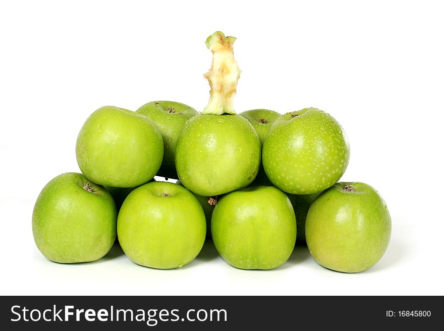 Several green apples on white background