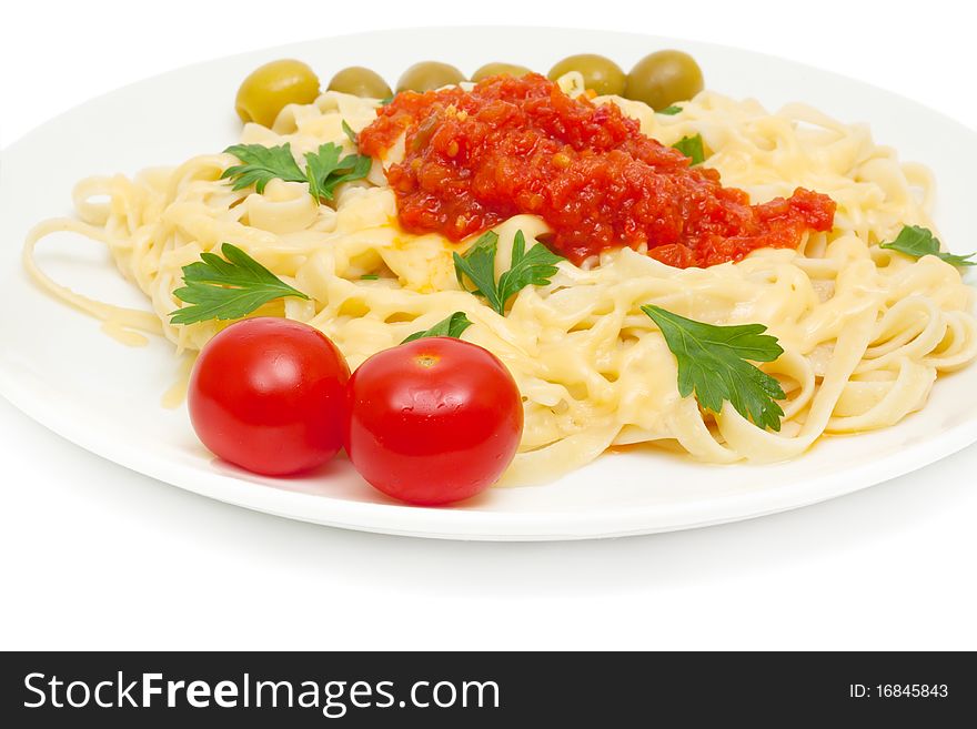 Pasta with cheese and sauce of peppers, tomatoes and garlic isolated on white