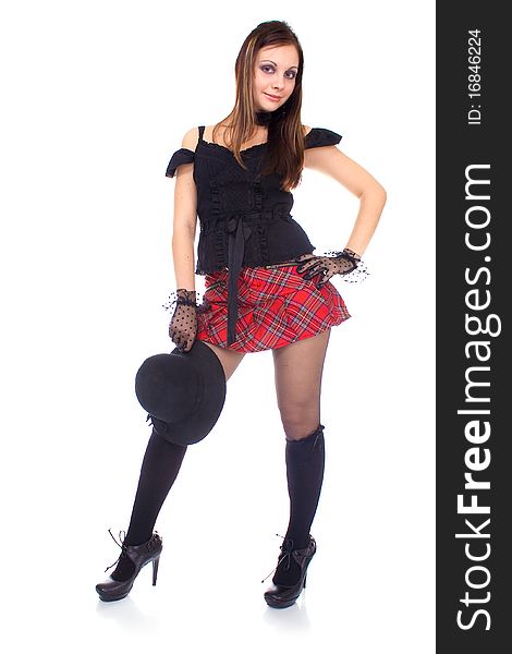 Gothic girl in mini skirt with hat on white background