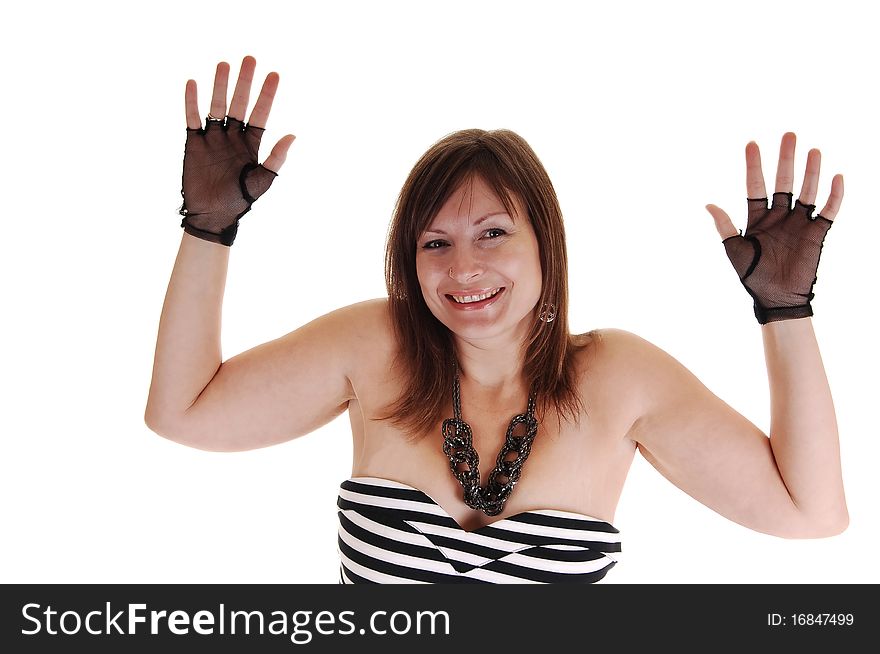 A middle aged woman is very happy and shows her happiness with 
her raised hands, in black cloves. A middle aged woman is very happy and shows her happiness with 
her raised hands, in black cloves.
