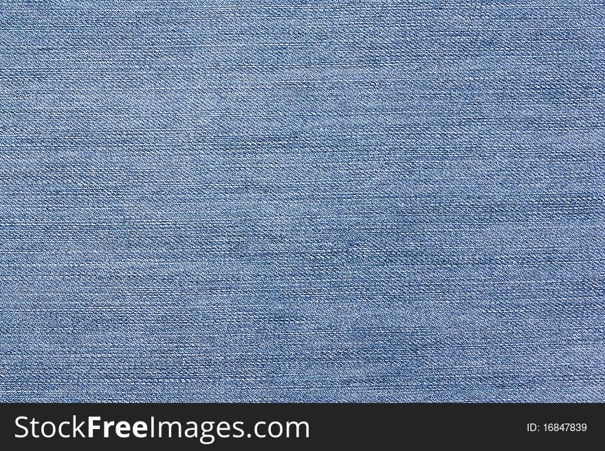 Texture of blue jeans an background