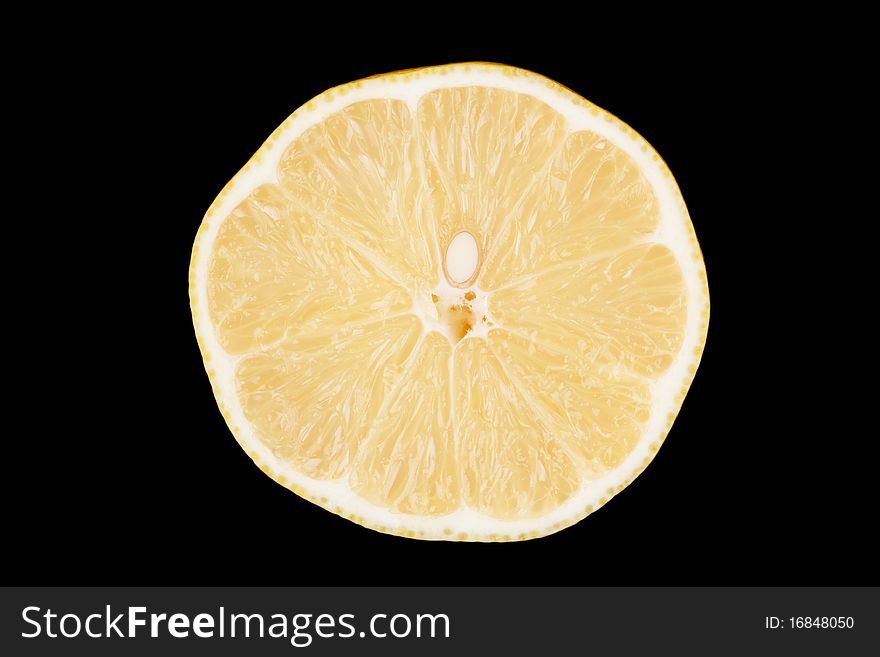 Lemon isolated on black background