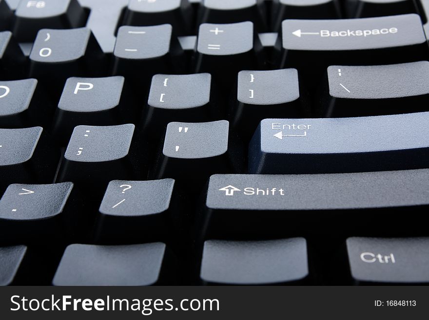 PC keyboard of black color closeup view. PC keyboard of black color closeup view