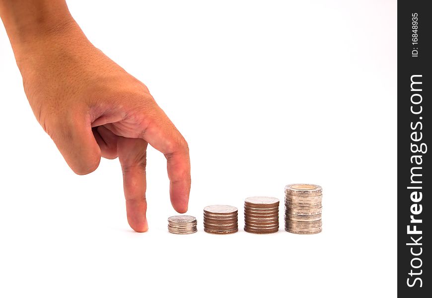 Chart made of columns of coins isolated over white background. Chart made of columns of coins isolated over white background