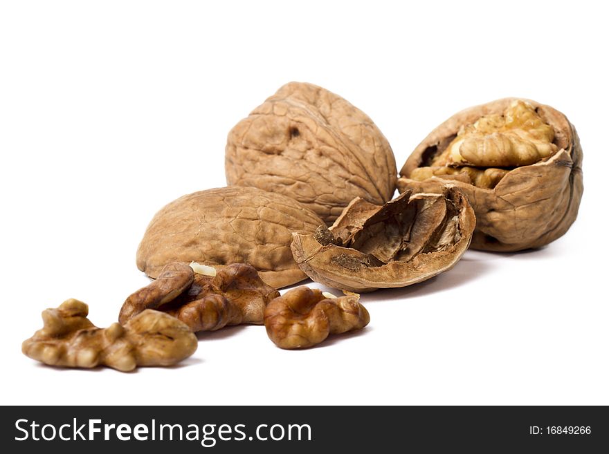 Close-up of a walnut isolated on white background