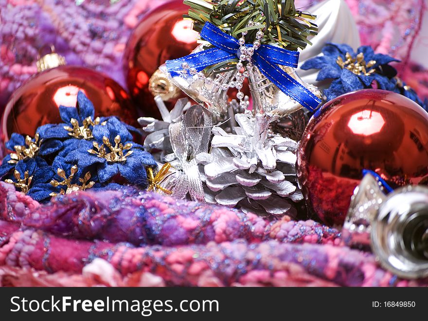 Different Christmas decorations on the soft colorful material. Different Christmas decorations on the soft colorful material