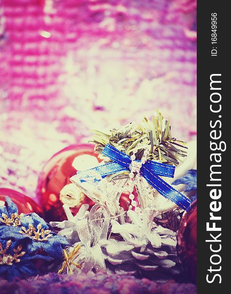 Different Christmas decorations on the soft colorful material. Different Christmas decorations on the soft colorful material