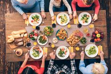 Every Member Of The Big Family Eats Stock Image