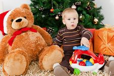 Baby Boy Discerning Santa Klaus At Christmas Stock Photo