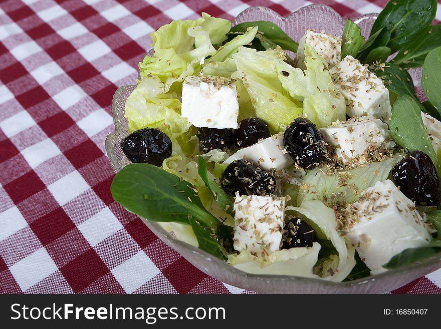 Greek salad, mediterranean cuisine with feta cheese and olives