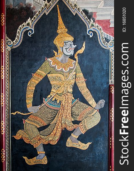 Thai art gold painting on wall in the Grand Palace Bangkok Thailand