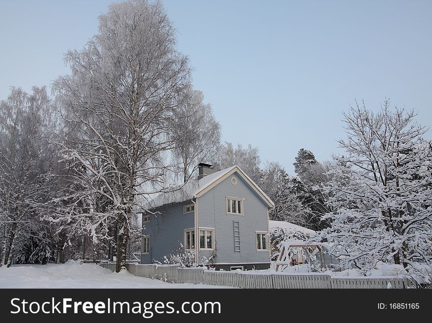 Wooden Finnish house in winter