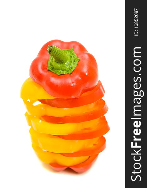 Fresh yellow and red pepper on white background
