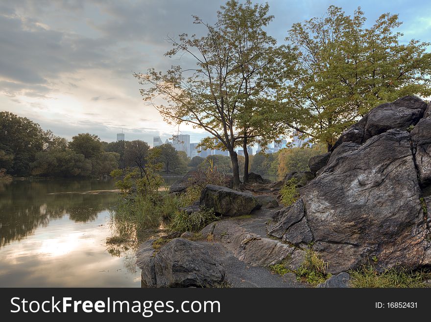 Early autumn in Central Park by the lake. Early autumn in Central Park by the lake