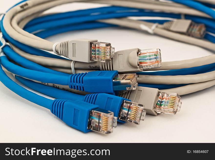 Ethernet cables isolated on white background. Gray and blue.