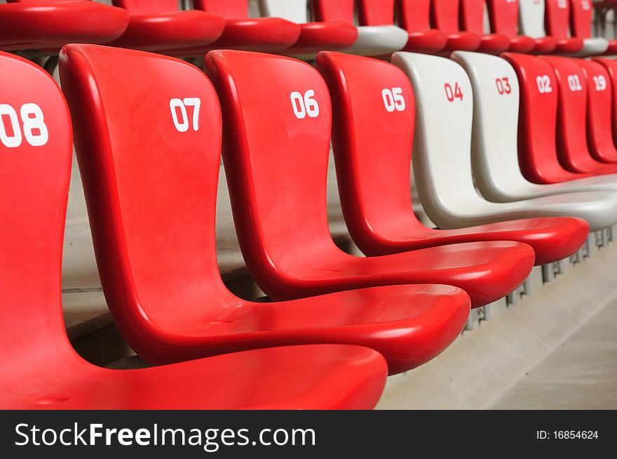 Red seats and white seats