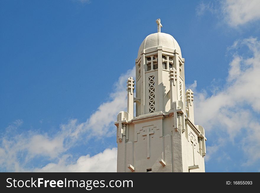 Closeup Of A Methodist Church Against Blue Sky