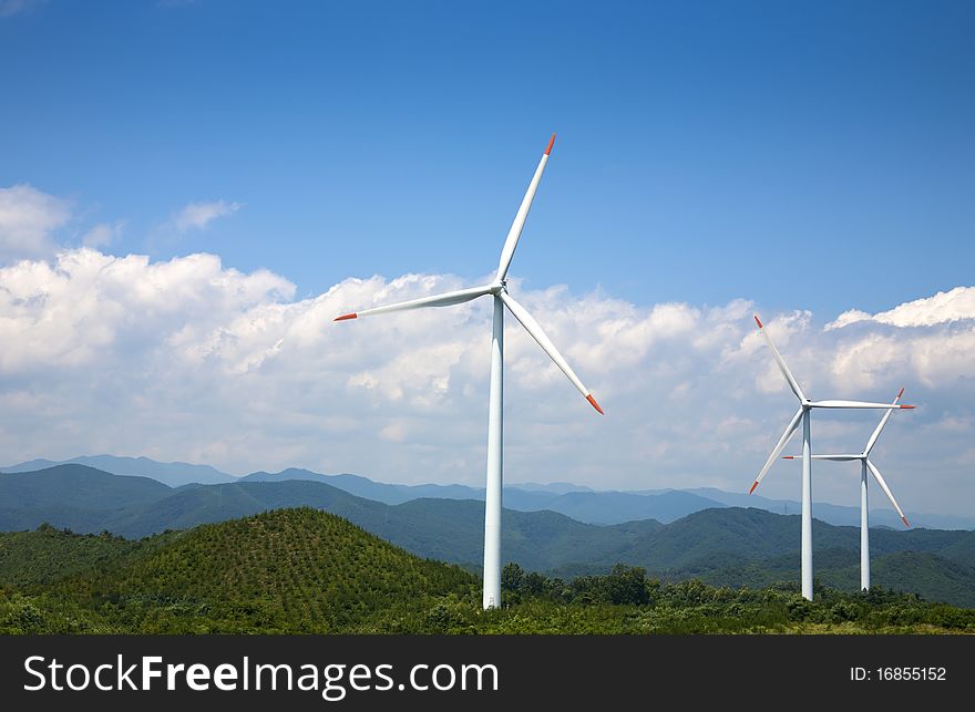 Power generating windmills is running on the hill