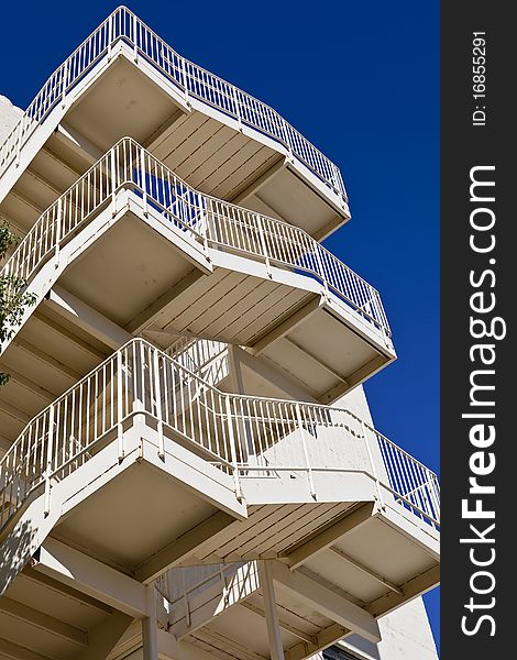 Metal fire escape on the side of a building. Metal fire escape on the side of a building