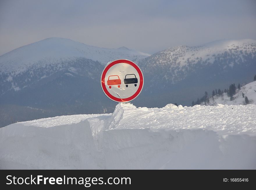 Road Sign In The Snowdrift. Highway M54. Southern Sibiria. Sayany mountain. Winter 2010.