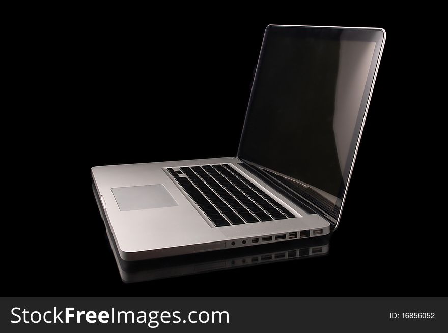 Aluminium laptop with desktop on black background. Aluminium laptop with desktop on black background