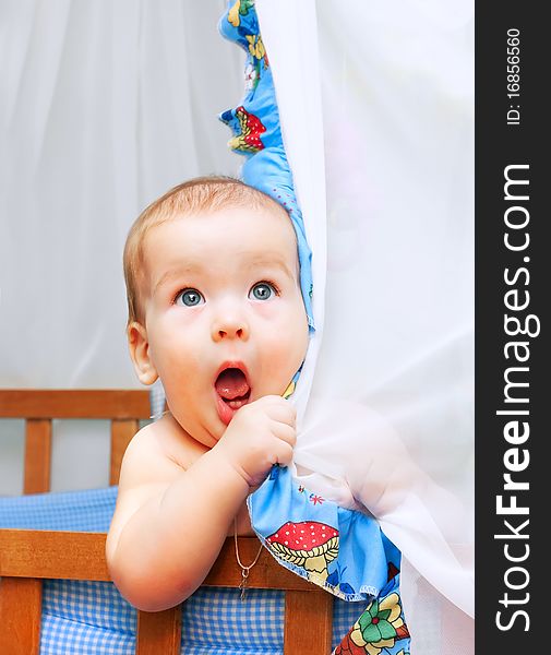 Small newborn baby on white background