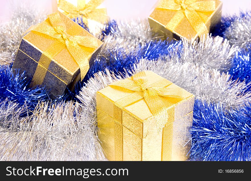 Several Christmas gifts on Christmes ornament background
