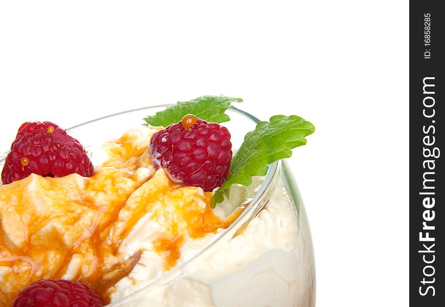 Raspberrys with yoghurt, isolated on the white background