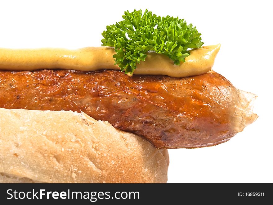 Sausage in a bun on a white background. Sausage in a bun on a white background