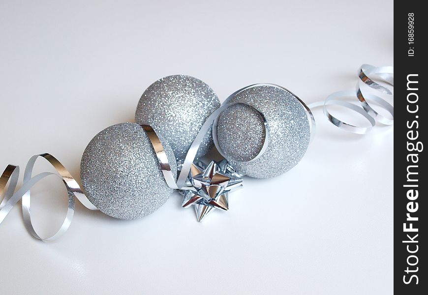 Silver Christmas balls and ribbon