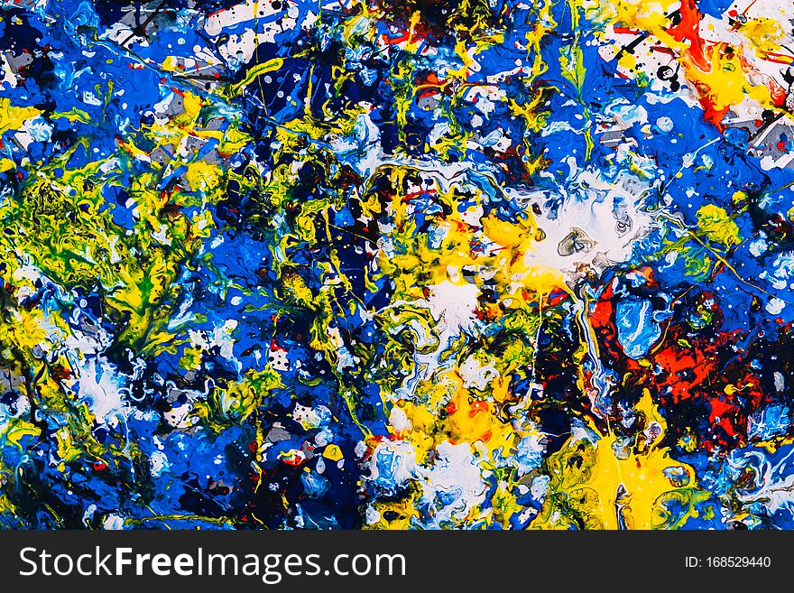 Abstract expressionism. contemporary art. Picture painted using the technique of dripping. Mixing different colors red yellow blue white black. A riot of color. Lines and spots. Horizontal orientation. Abstract expressionism. contemporary art. Picture painted using the technique of dripping. Mixing different colors red yellow blue white black. A riot of color. Lines and spots. Horizontal orientation