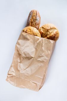 Whole Grain Bread With Seeds In Ecology Paper Bag Royalty Free Stock Photos