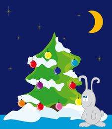 Rabbit Under The Christmas Tree Royalty Free Stock Photography Rabbit Under The Christmas Tree Royalty Free Stock Photography