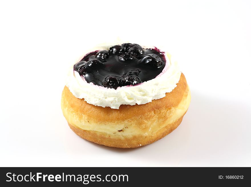 Bakery food blueberry fruit donut on white background isolated