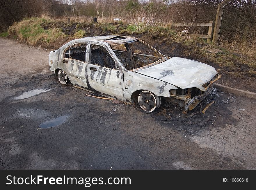 A stolen car, found burnt out in a side street.