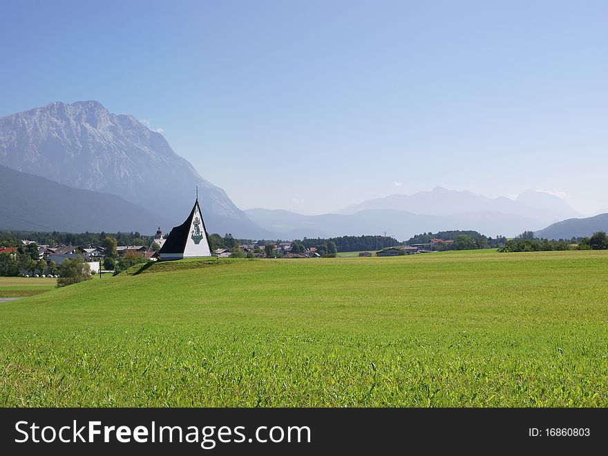 Summer Alpine Landscape In A Misty Morning