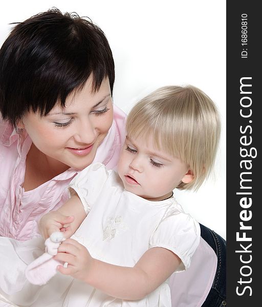 Young mother and daughter isolated over white. Young mother and daughter isolated over white