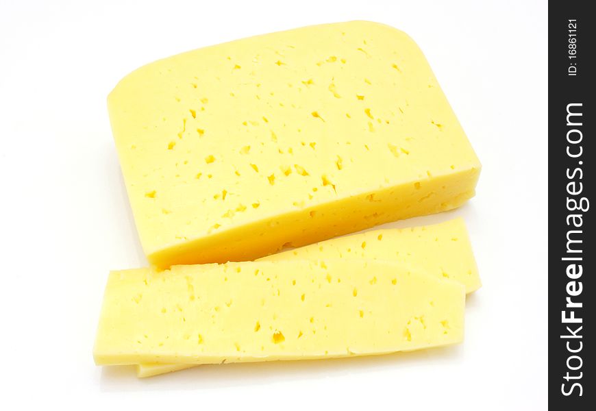 A piece of Swiss cheese isolated on white yellow delicatessen;